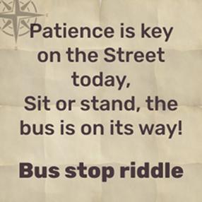 The bus is on its way, people wait for it and get on - bus stop!